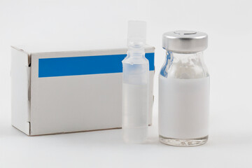 bottle of medicine and glass