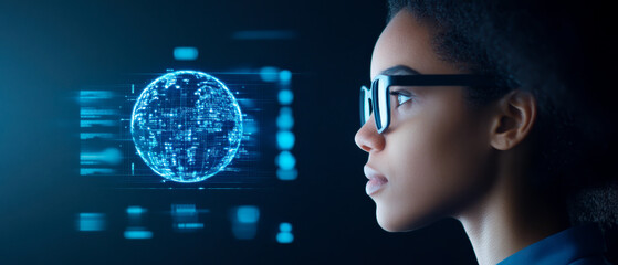A woman wearing glasses looks intently at a futuristic digital globe with data overlays in a dark, tech-driven environment.