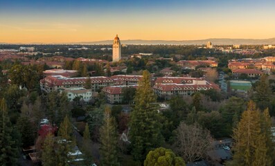 Aerial view of Stanford University campus showcasing the iconic Hoover Tower and surrounding buildings at sunset. Palo Alto, California, USA. 28 December 2024.