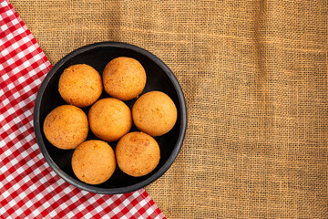 Delicious typical Colombian buñuelos - round, fried with cheese