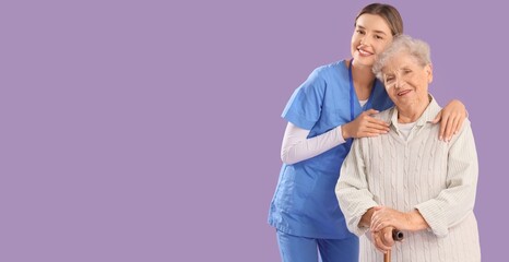 Nurse hugging senior woman on lilac background with space for text