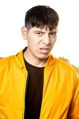 Young Latino Man Grimacing: Disgust / Skepticism Expression
