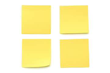 Four blank yellow sticky notes isolated on a transparent background, perfect for adding your own text or reminders