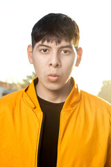 Young Latino Man Whistling with ‘O’ Mouth: Expression of Surprise / Focus
