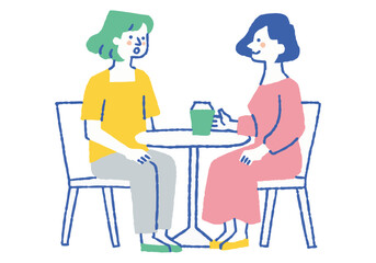 Women talking at a table in a park_Color