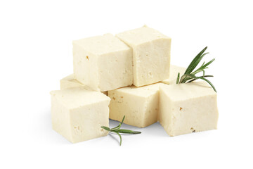 Cut tofu cheese and rosemary twigs isolated on white background