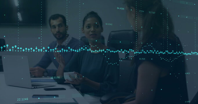 Discussing businesswoman analyzing data waves at office boardroom with laptop phone coffee mug