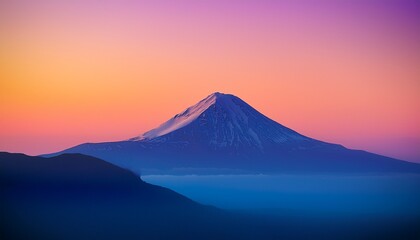 Fototapeta premium a stunning minimalist background of a single mountain unicake against a gradient sky
