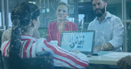 Collaborating three colleagues reviewing laptop charts at conference table, with padlock overlay