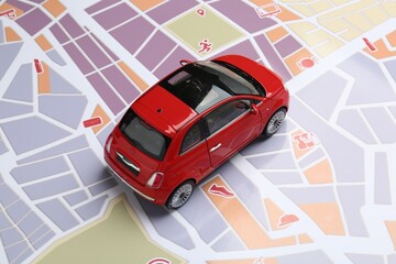 Road trip concept. Car model on city map