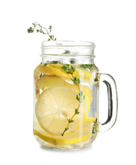 Mason jar of fresh lemon infused water with ginger and thyme on white background