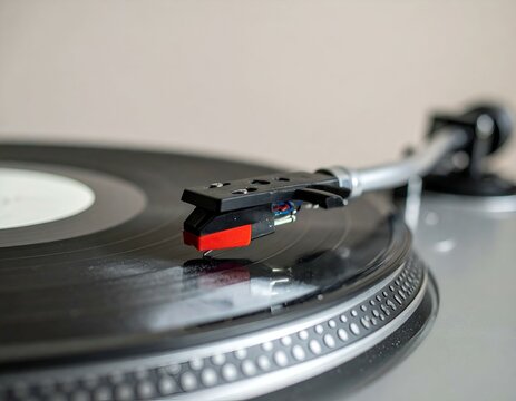 Close-up of a turntable needle on a vinyl record, showcasing the detail of the technology.