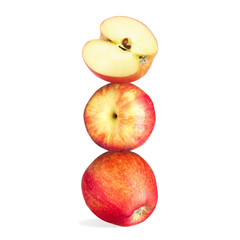 Apples stacked on top of each other against white background. Balance