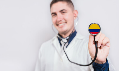 Doctor showing stethoscope with Colombia flag. Colombia national healthcare concept
