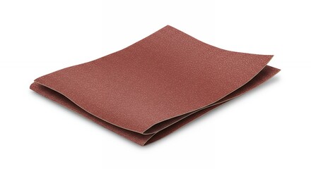 Folded sandpaper against white background