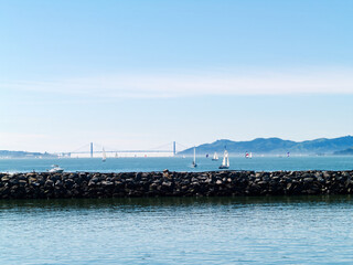 Boats On San Francisco Bay With Bridge And Breakwater