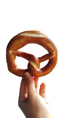 hand holding pretzel isolated