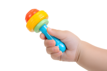 Colorful Baby Rattle Toy in a Small Hand Against Black Background