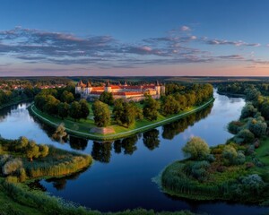 Panoramic castle at dawn over water