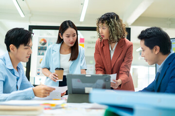Group of creative Businesspeople brain storm meeting presentation,discussing roadmap to product launch, planning,strategy,dashboard,new business development,working with new startup project in office