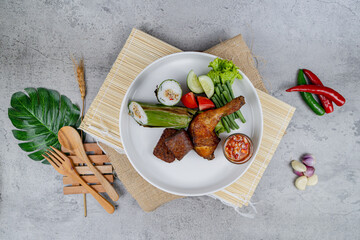 Nasi Bambu Runcing
A traditional rice dish steamed inside bamboo, infused with aromatic spices and served with assorted local accompaniments.