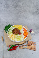 Rujak Buah Sambalbuni
An assortment of tropical fruits served with a house-special sambal that blends sweet, sour, and spicy elements for a zesty fruit salad experience.