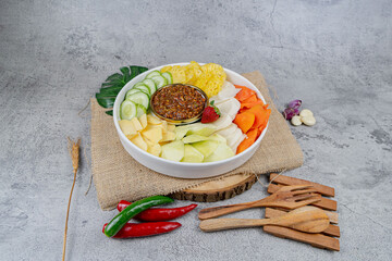 Rujak Buah Sambalbuni
An assortment of tropical fruits served with a house-special sambal that blends sweet, sour, and spicy elements for a zesty fruit salad experience.