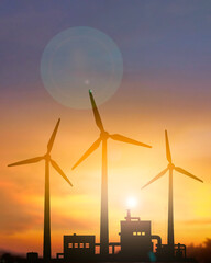 Wind Turbines Silhouette at Sunrise Time