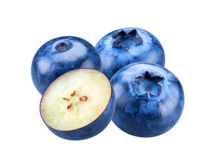 Obraz premium Closeup of three plump blueberries one halved showcasing their deep blue skin and pale yellow flesh with tiny seeds.