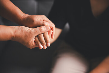 Hope and trust with crisis concept. Closeup, love and holding hands for support, comfort and care...