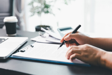 Business person with contract law and paper work for business finance, loan application form,...