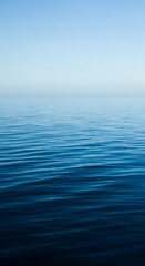 Obraz premium Calm ocean water background image, blue sea waves, peaceful seascape, ocean horizon, nature photo