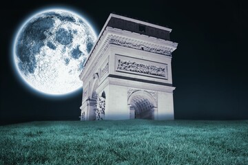 Bright moon over arc de triomph