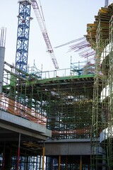 Crane and building construction site