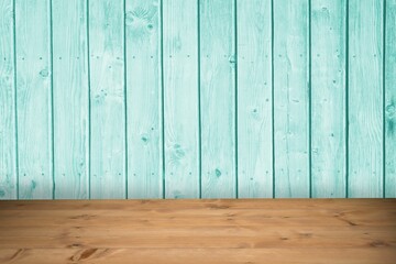 Wooden tabletop spanning full width is appearing in flat design interior, with turquoise plank wall