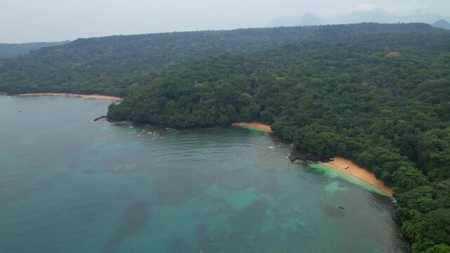 Flying over the coast towards the Margarida beach with the magnificent forest in the background,Ilha do Principe (Prince Island) S&atilde;o tome e Principe,Africa