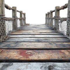 Obraz premium A rustic wooden pier with rope railings and netting, extending into a bright, white background.