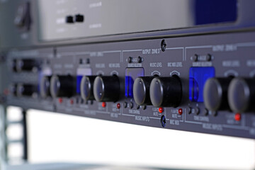 Front control panel of the audio amplifier with level controls and display. 
