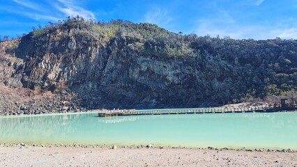 Lake Kawah Putih in Ciwidey, Bandung, West Java, Indonesia is a tourist destination formed from a volcanic eruption centuries ago