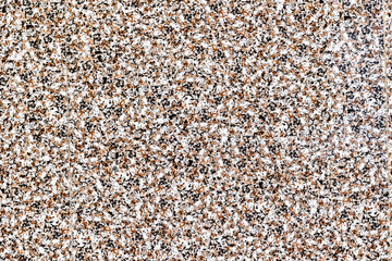 Close-up of speckled granite surface with textured pattern