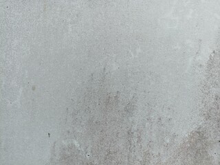 Textured Gray Concrete Wall Background. Minimalist textured gray concrete wall with subtle stains...
