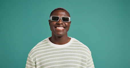 Happy, sunglasses and face of black man in studio with trendy style, clothes and outfit. Attitude,...