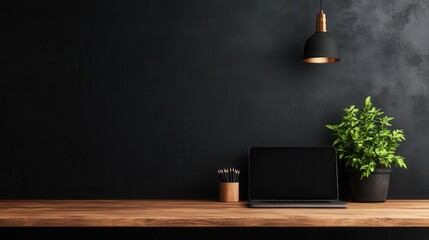 A stylish and minimalistic workspace featuring a sleek laptop, a vibrant green plant, and warm lighting, promoting productivity and creativity in a serene environment.