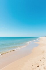 Serene Beach with Clear Blue Sky and Calm Sea