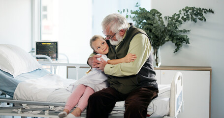 Hug, healthcare and grandfather with child in hospital for support, pediatric patient and love....