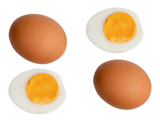 Top view set of two raw brown chicken eggs and two boiled or cooked eggs in two halves with egg yolk isolated with clipping path in png file format
