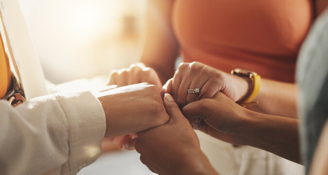 Holding hands, support and group of people for prayer circle, worship and spiritual belief. Religion, Christianity and friends together for bonding at bible study for guidance, praying and faith