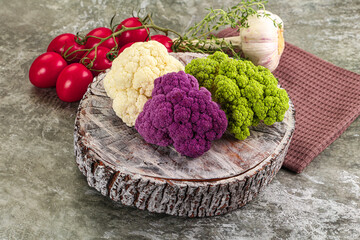Raw cauliflower different colors heap
