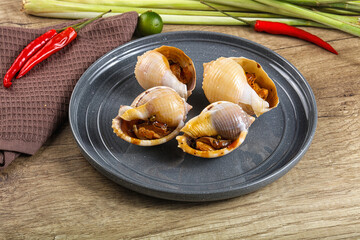 Snails baked with garlic and spices