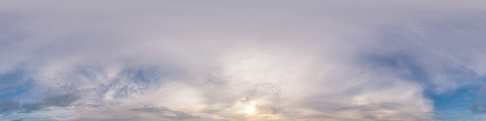 Sunset sky with bright glowing pink Cumulus clouds. Seamless spherical HDR 360 panorama. Full...